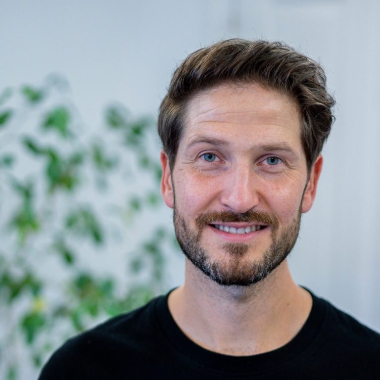 Über mich und meine Qualifikationen als Bikefitter Porträt des Bikefitters neben dem Abschnitt „Warum ich Bikefitter bin“